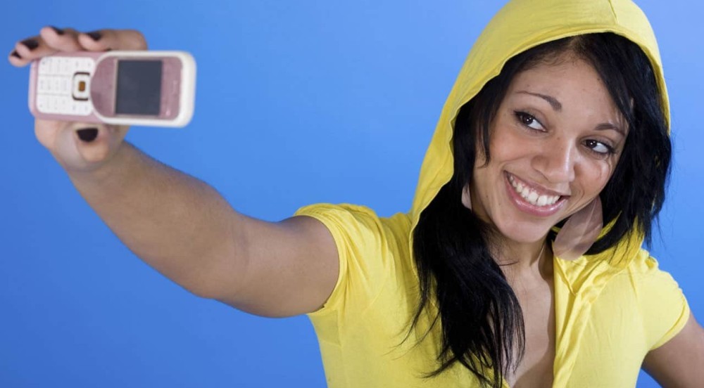 Woman Taking Picture with Phone