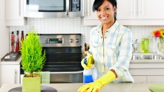 african american woman cleaning house