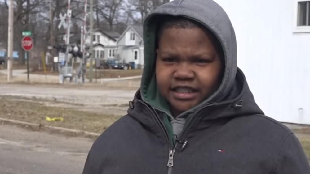 Michigan Boy Fills Street Potholes in His Neighborhood