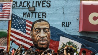 NEW YORK, NY - JULY 13: A mural painted by artist Kenny Altidor depicting George Floyd is unveiled on a sidewall of CTown Supermarket on July 13, 2020 in the Brooklyn borough New York City. George Floyd was killed by a white police officer in Minneapolis and his death has sparked a national reckoning about race and policing in the United States. (Photo by Stephanie Keith/Getty Images)