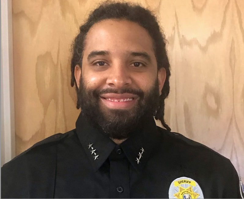 Wyoming police officer Jamin Johnson was subjected to endure racist remarks and actions by a white colleague.