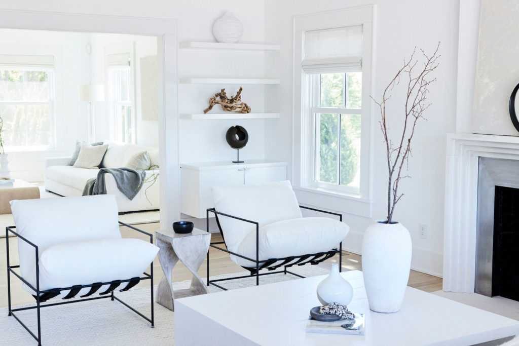 Minimal white living room design by Leia T. Ward's black owned interior design firm