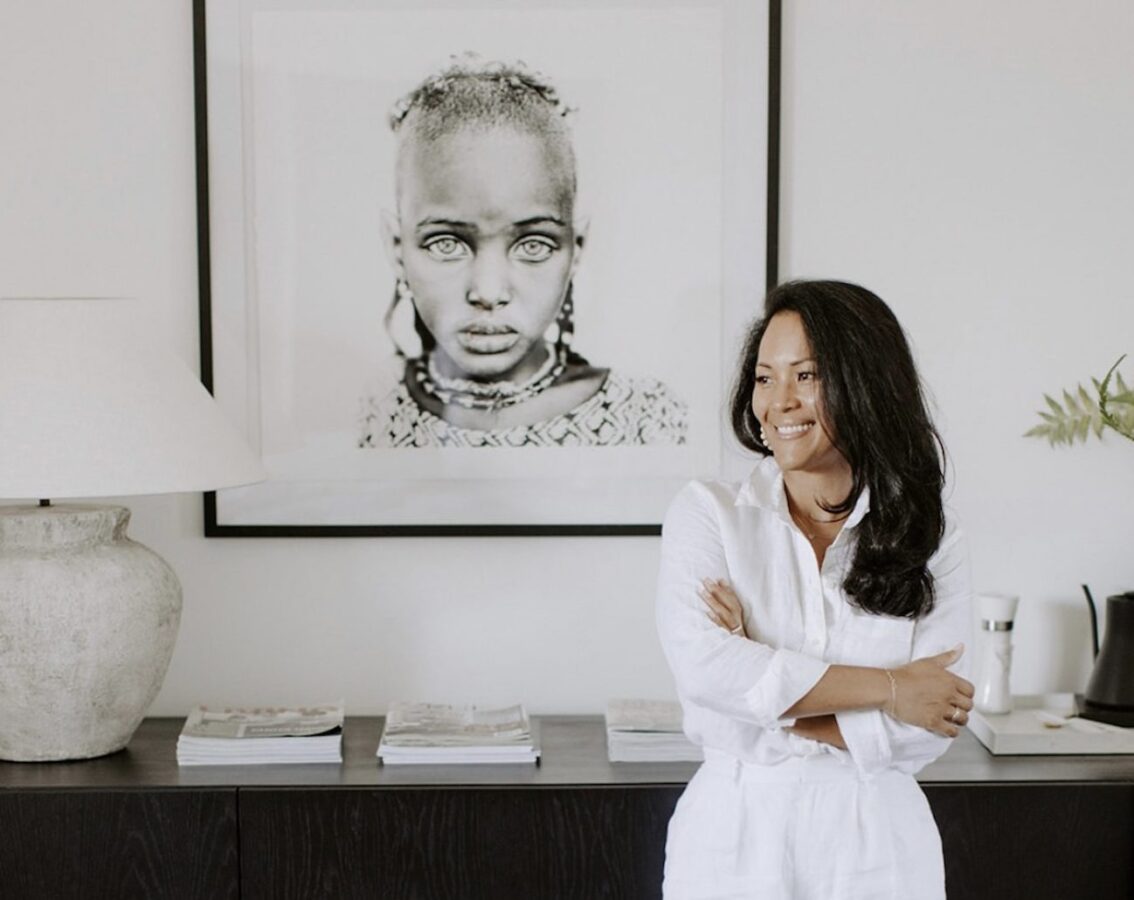 Leia T. Ward, black interior designer posing in an elegant room