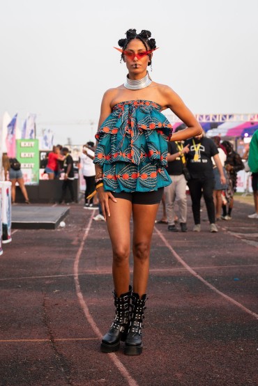 Bantu knots and plenty of leg at Afrochella 2022. Photo by Ernest Ankomah.