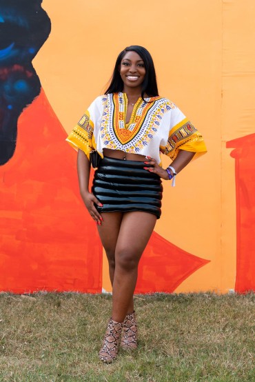 A modern mini paired with a cropped top in traditional African print at Afrochella 2022. Photo by Ernest Ankomah.