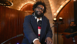 US musician Questlove spins after the Tommy Hilfiger's Fall/Winter 2024 collection show during New York Fashion Week at Grand Central Station in New York City on February 9, 2024. (Photo by ANGELA WEISS / AFP) (Photo by ANGELA WEISS/AFP via Getty Images)